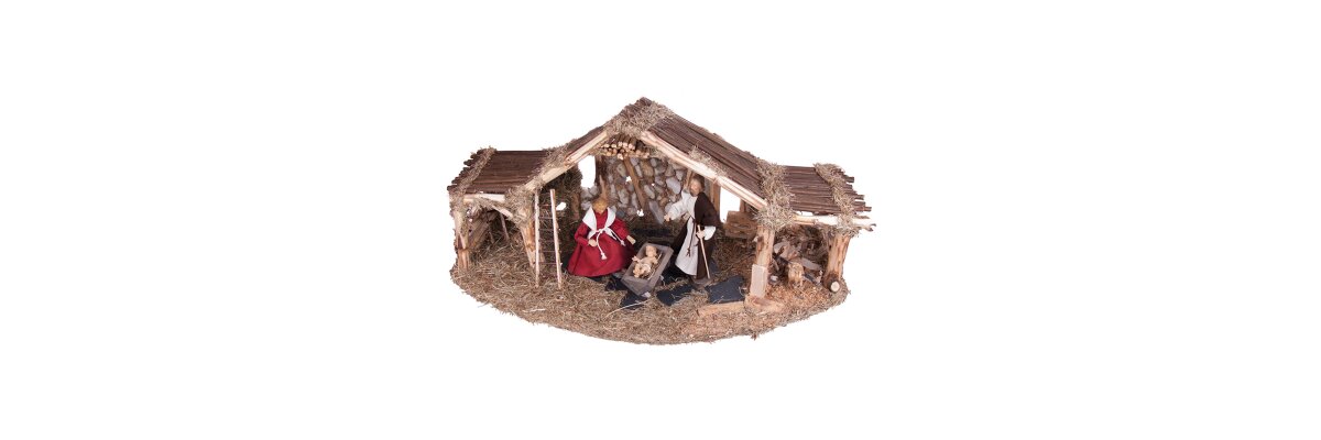 Krippenstall mit Krippenfiguren - Ein traditionelles Weihnachtsfest - Krippenfiguren und Krippenstall