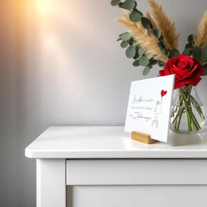 Spruchtafel „Liebe macht aus einem Haus ein Zuhause”