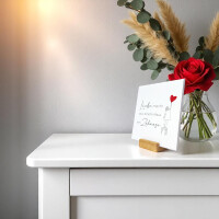 Spruchtafel „Liebe macht aus einem Haus ein Zuhause”